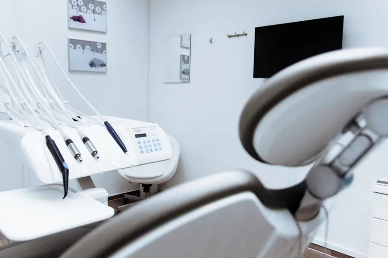 Dental chair and lamp in a treatment room